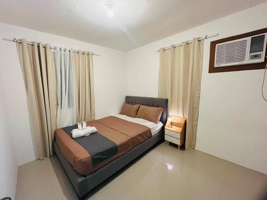 A Cozy 2-Bedroom Home In Malolos - Prime Location Exterior photo